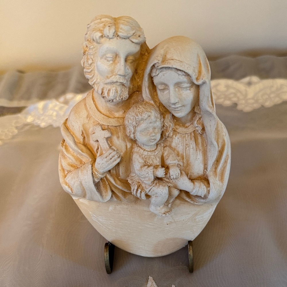 Sacred Family Cream and Tan Sculpture Displayed on a Metal Stand
